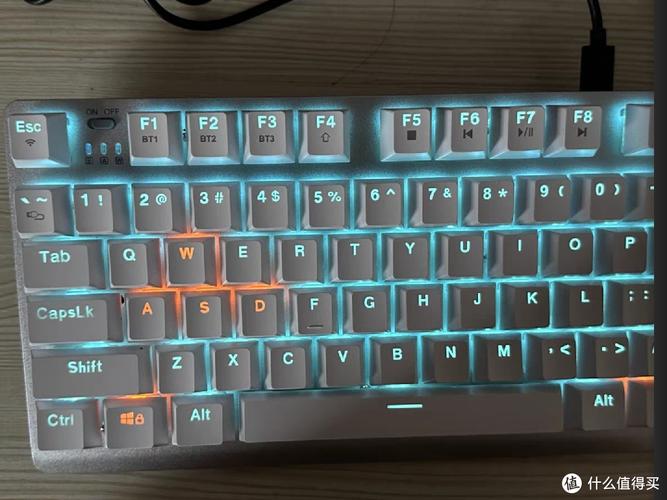 Close-up of a white mechanical keyboard with rgb lighting