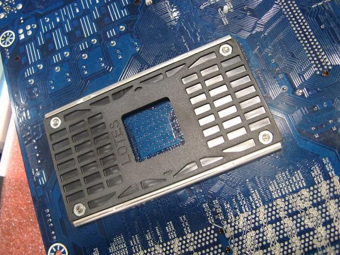 Computer motherboard with CPU socket and memory slots