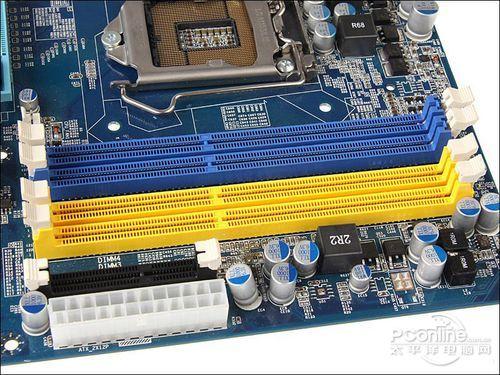 Close-up of CPU socket and memory slots on motherboard