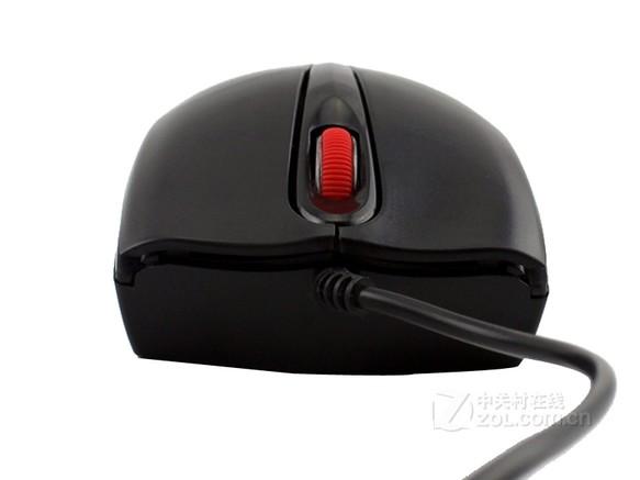 Hand using wired mouse on computer desk