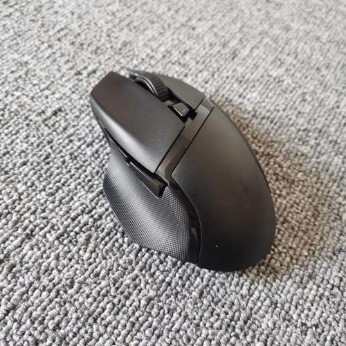 Gamer using mouse in intense gameplay