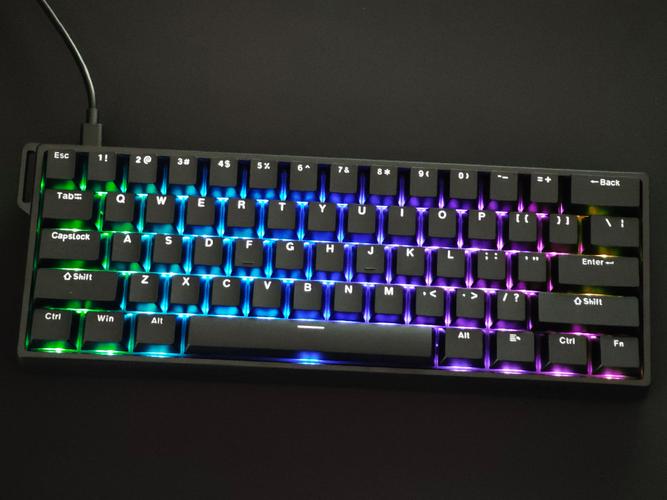 Cozy black RGB keyboard setup on wooden table