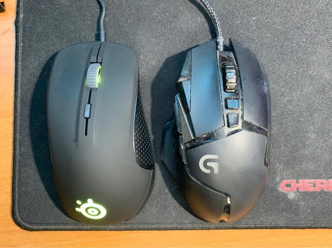 Gamer using mouse in intense gameplay