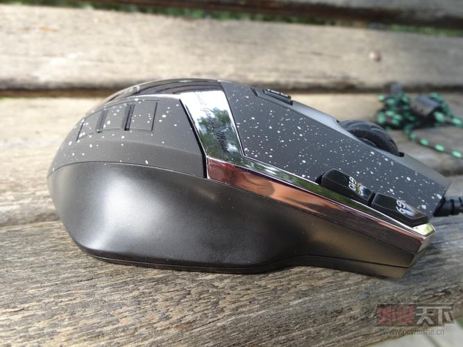 Black wired gaming mouse on surface