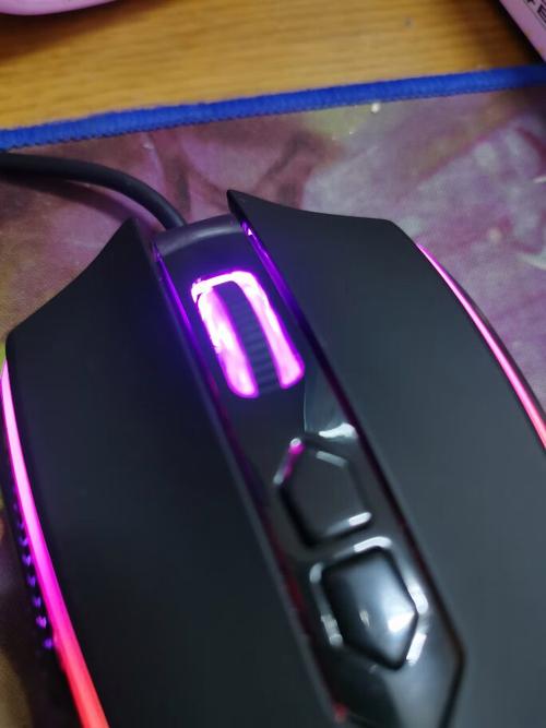 Bottom view of gaming mouse hardware details