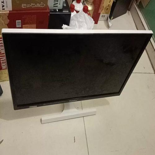 Sleek computer monitor in workspace environment