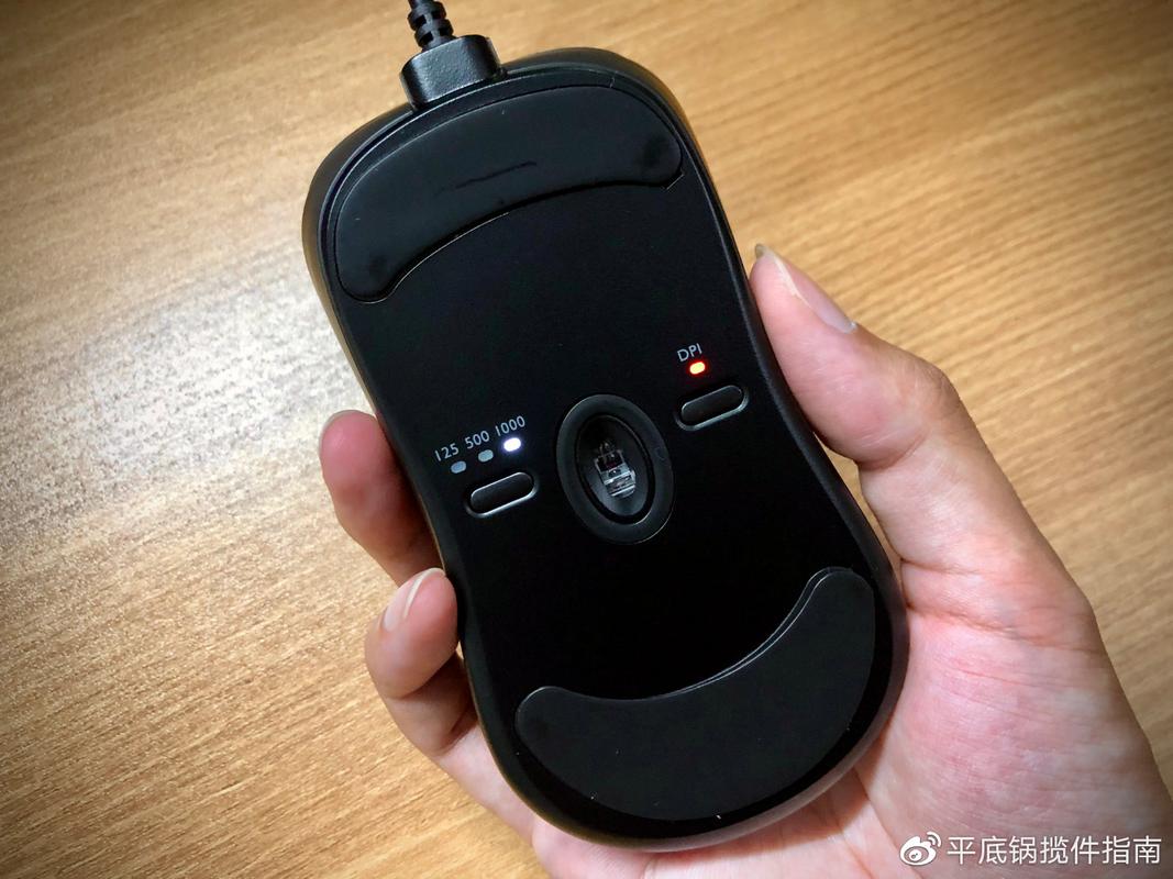 Gaming mouse technical close-up with sensor detail