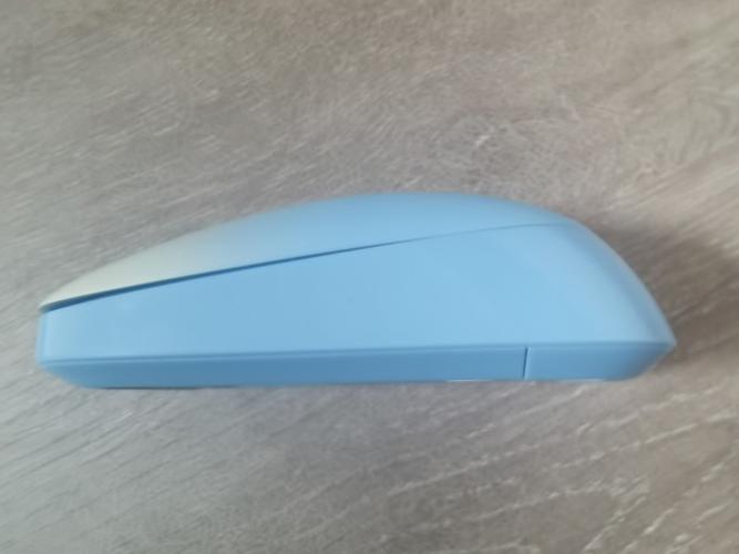 Close-up of lightweight office mouse in pink color