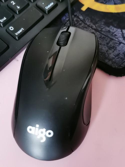 Wired mouse in office workspace setup
