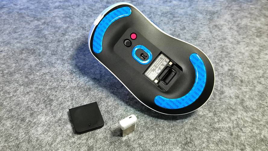 Gaming mouse in use on surface