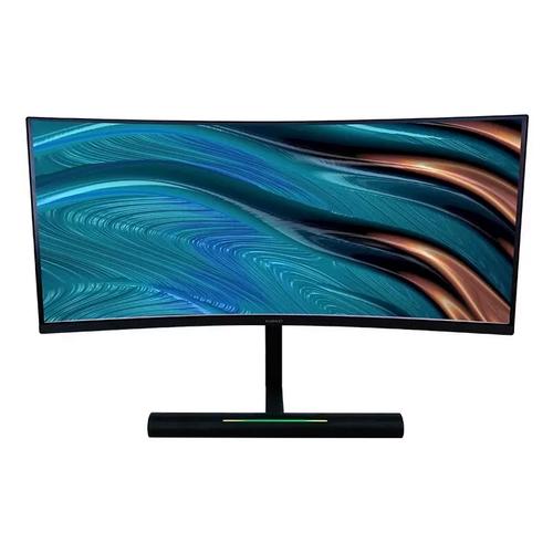 Modern desk with curved monitor and peripherals