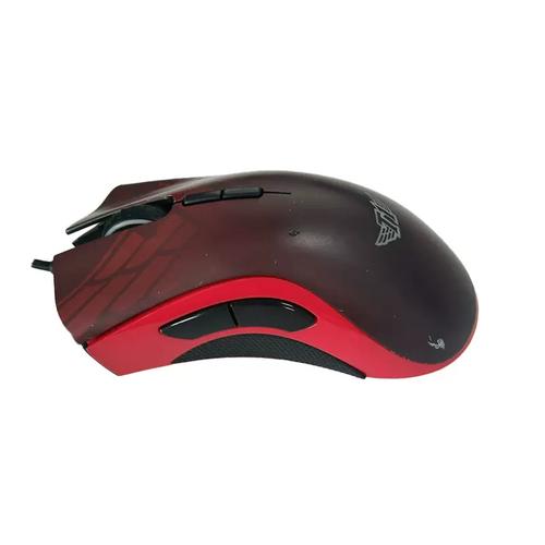 Ergonomic gaming mouse on desk setup