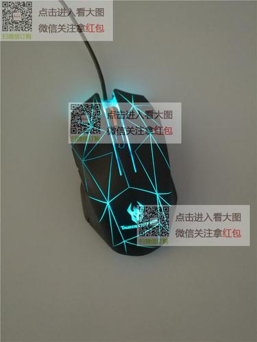 Wired black computer mouse on desk