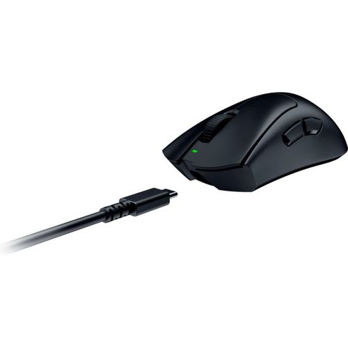 Wired gaming mouse on desk with side grips