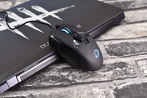 Gaming mouse on desk with modern tech aesthetic