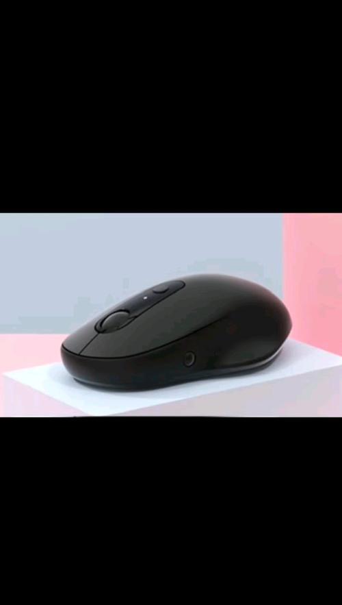 Wireless mouse with battery compartment visible