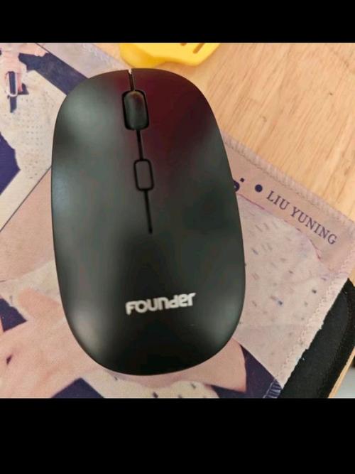 Person using wireless mouse productively in office