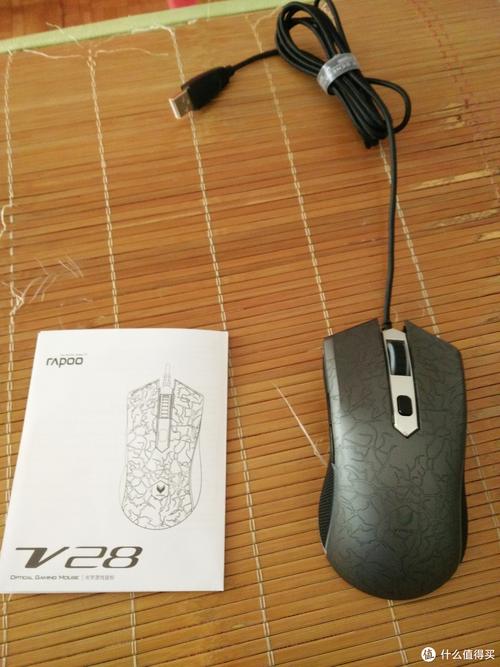 Black computer mouse on dark surface