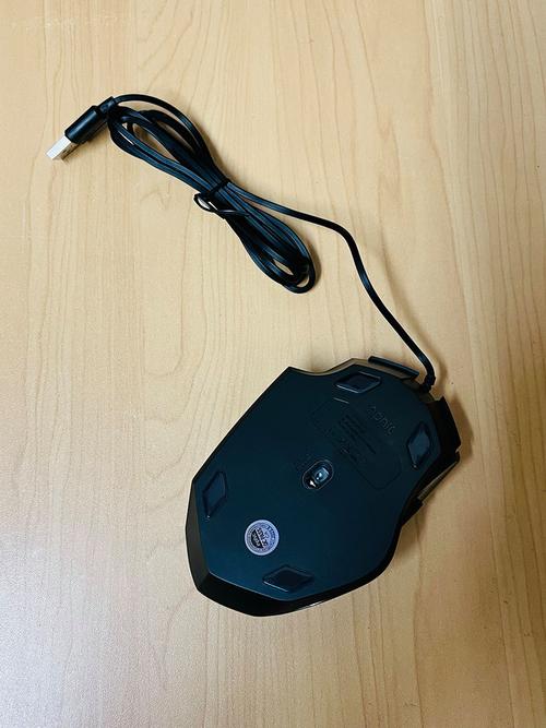 Black cordless mouse on pad