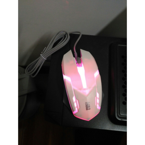 Black computer mouse with cord detailed view