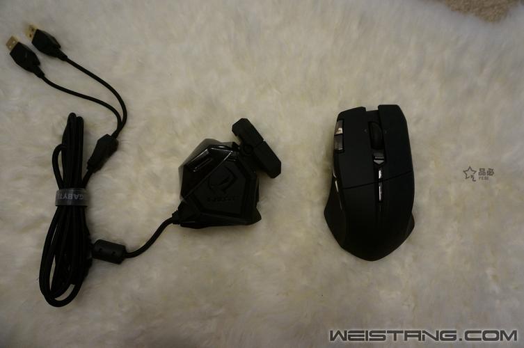 Black gaming mouse in action on RGB setup