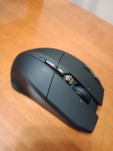 Wireless black gaming mouse with detailed view