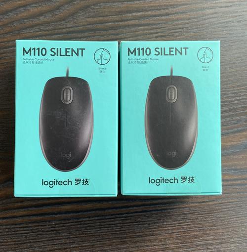 Hand using wired mouse on desk