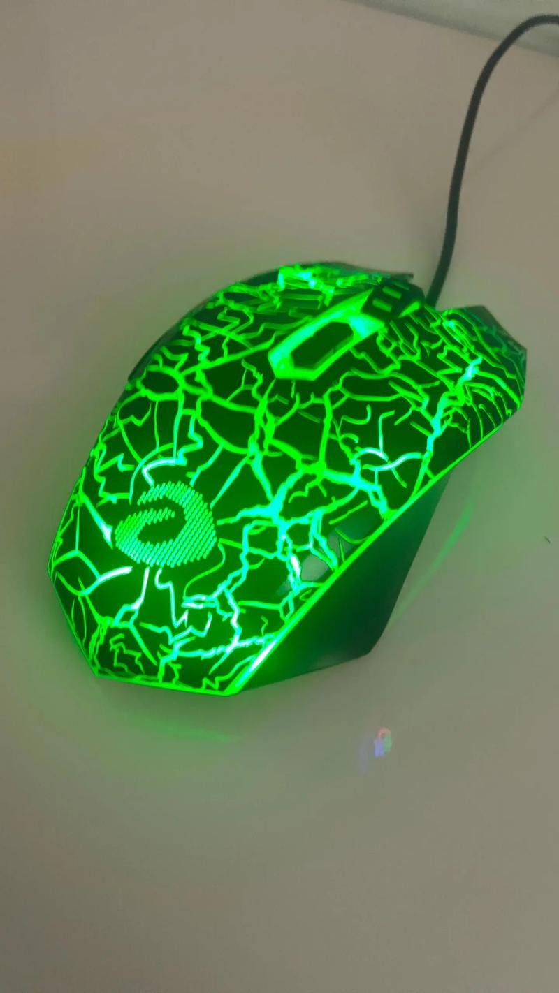 Wired gaming mouse with RGB and buttons highlighted