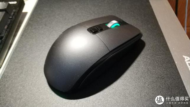 Ergonomic black gaming mouse on desk