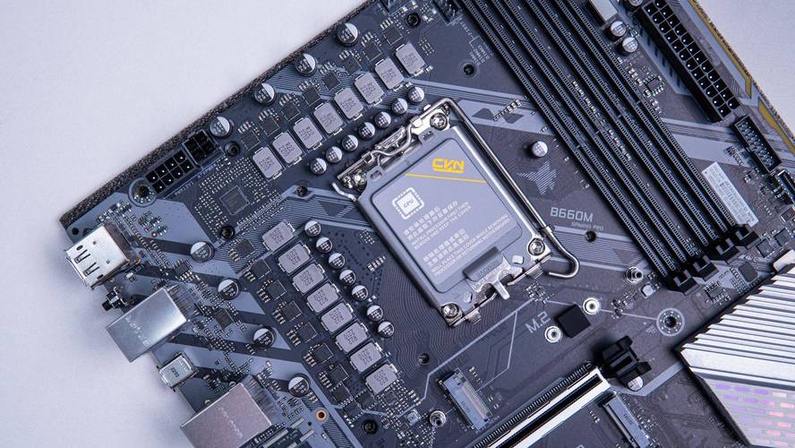 White gaming motherboard with crosshair design details