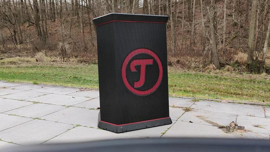 Compact metal bluetooth speaker close-up view