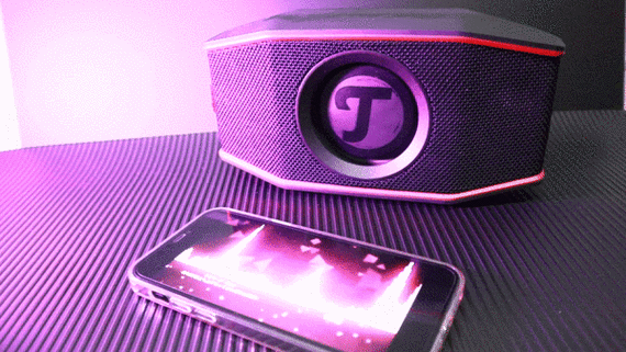 Bluetooth speaker playing music performance