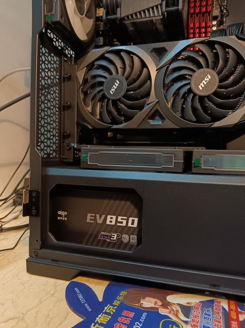 Close-up of computer PSU hardware with fan and connectors