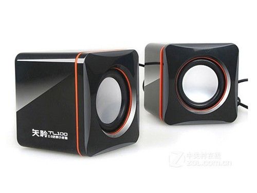 Small computer speaker on desk