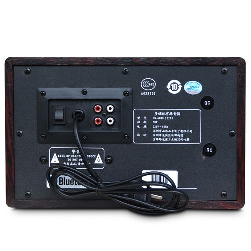 Black subwoofer in home entertainment setup