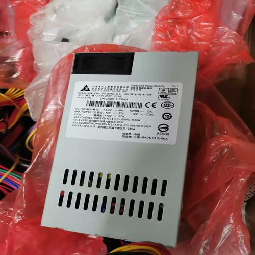 Black computer PSU with cables