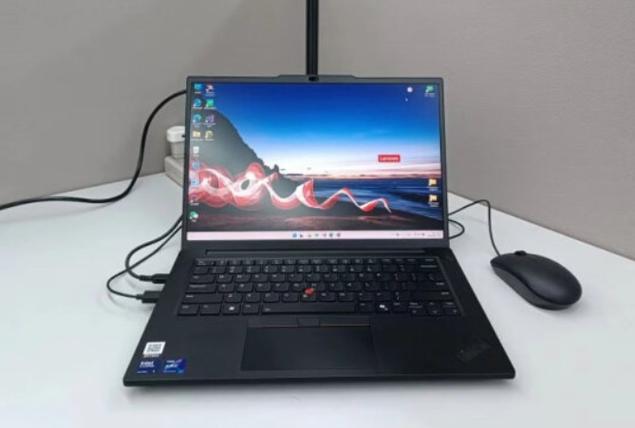 Black monitor on desk in workspace