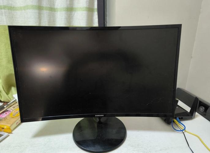 Desk setup with active monitor display