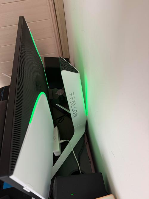 Large curved monitor close-up showing sleek silver design