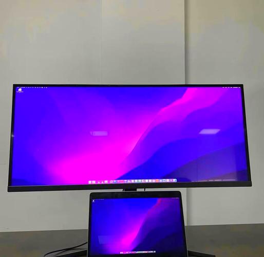 Professional desk setup with large monitor