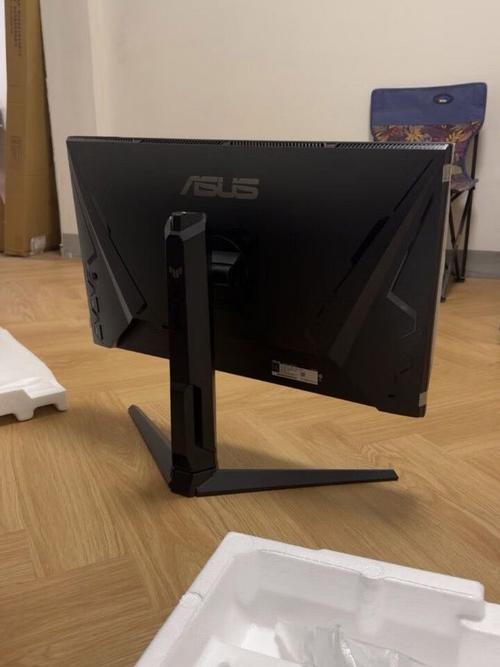 Gamer playing FPS on high refresh rate monitor