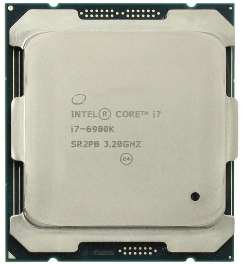 Technician handling high-performance desktop CPU