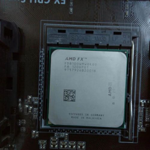 Technician testing computer CPU