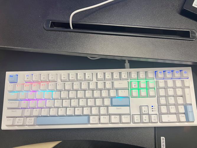 Close-up backlit mechanical keyboard typing