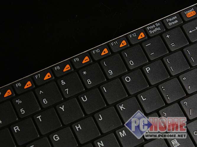 Hands typing on slim wireless keyboard