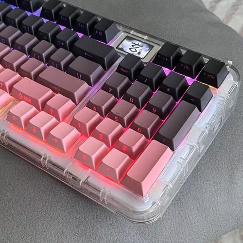 Modern mechanical keyboard close-up with display and keys