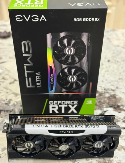 White RTX graphics card with three fans and heatsink