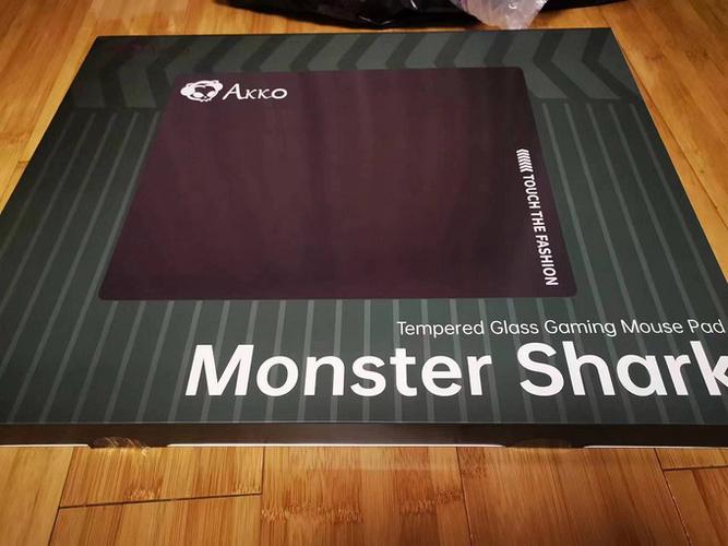 Black gaming mouse close-up view showing ergonomic shape