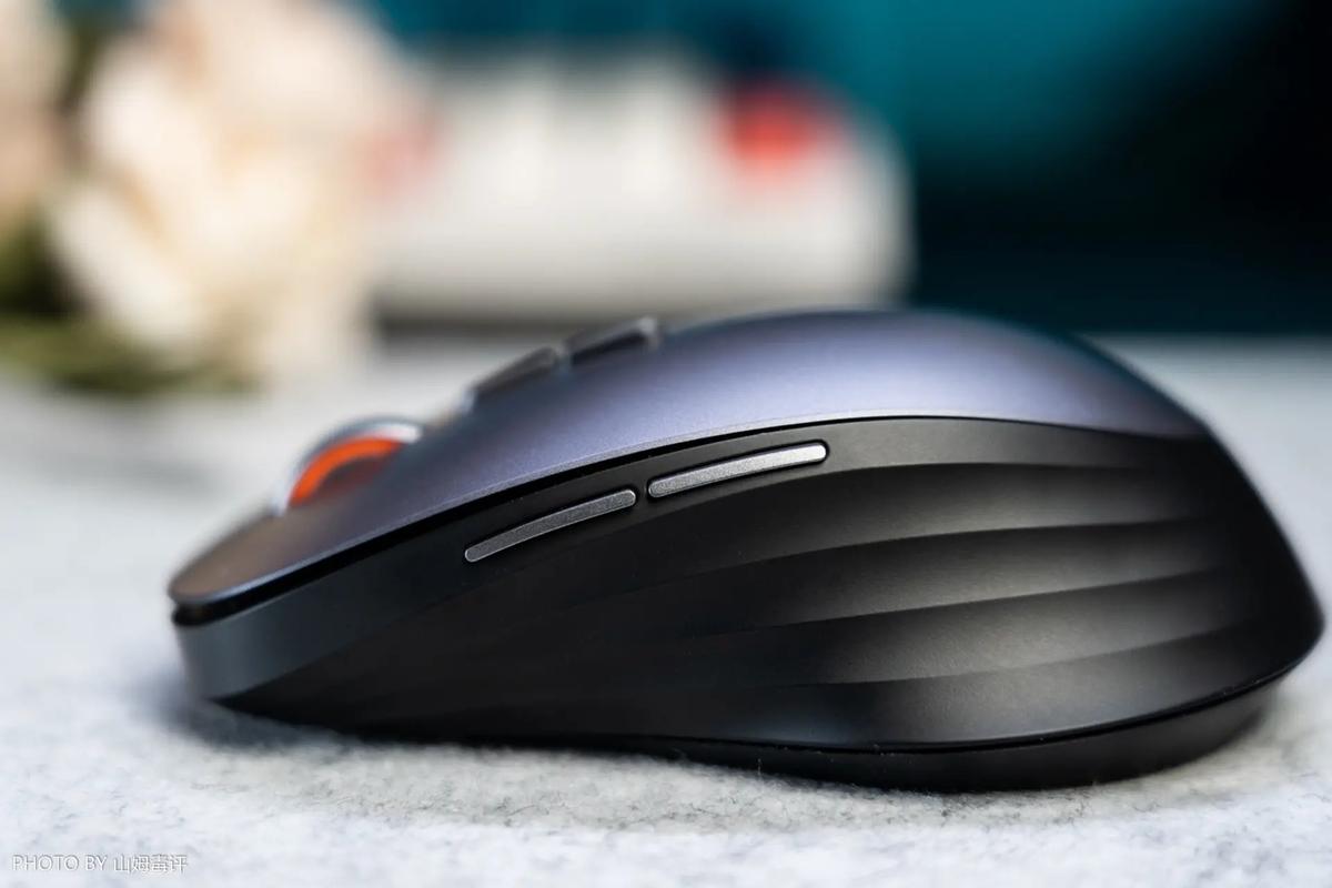 Ergonomic wireless mouse close-up with clean lines