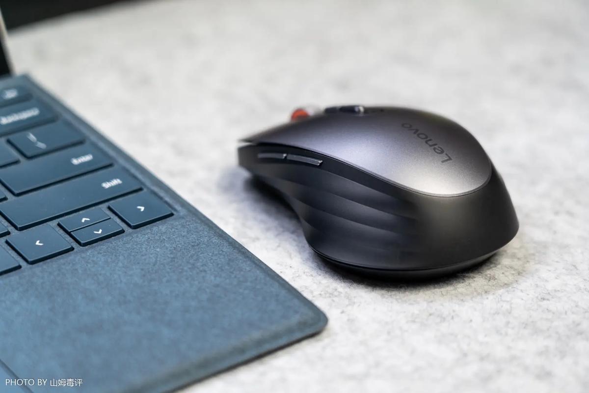 Wireless mouse with keyboard in workspace setup